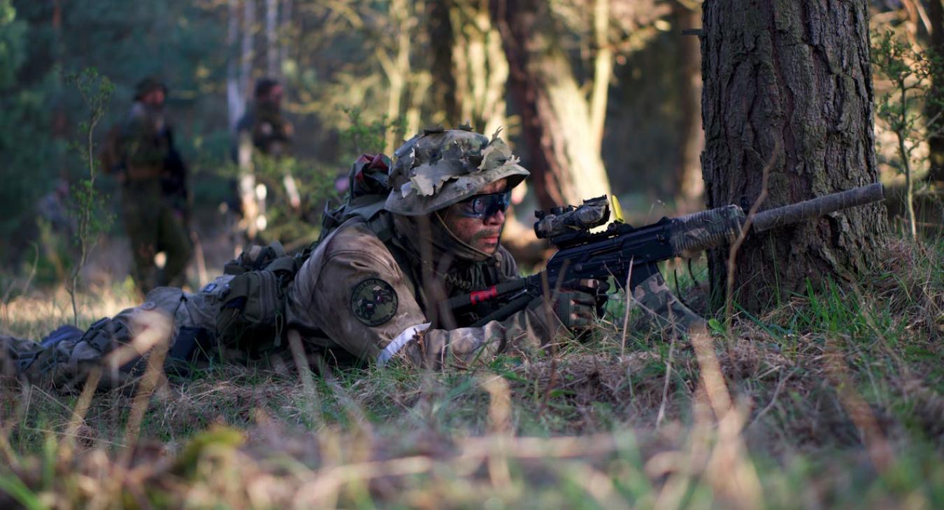 Soldier in combat, war